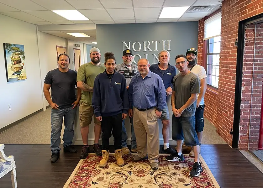 North Point Maintenance crew in office lobby